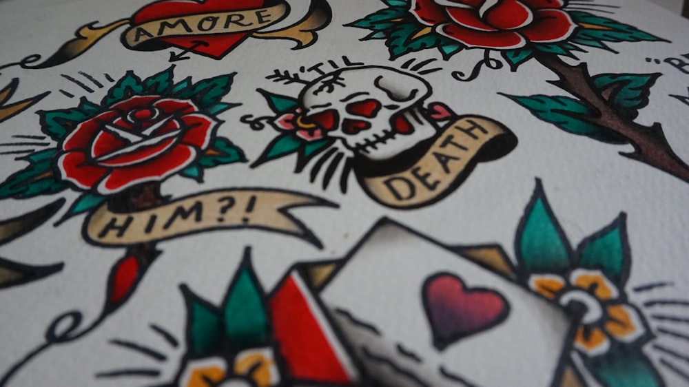 Old-school flash sheet with roses, heart and skull