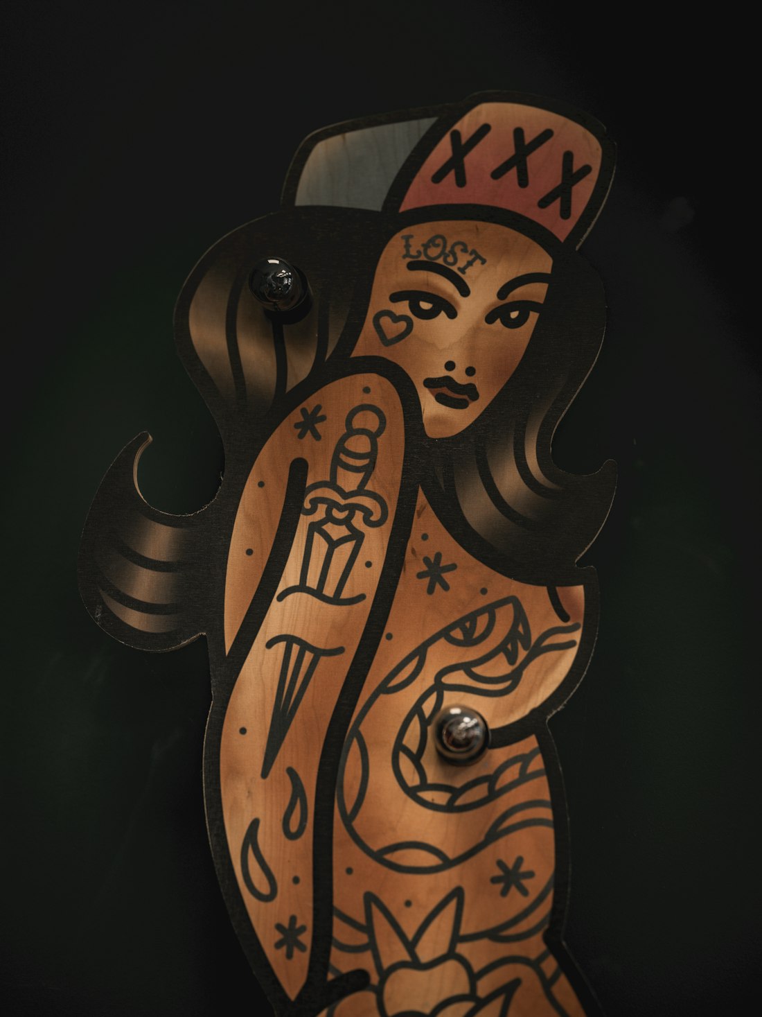 Traditional pin-up girl flash with dagger and snake